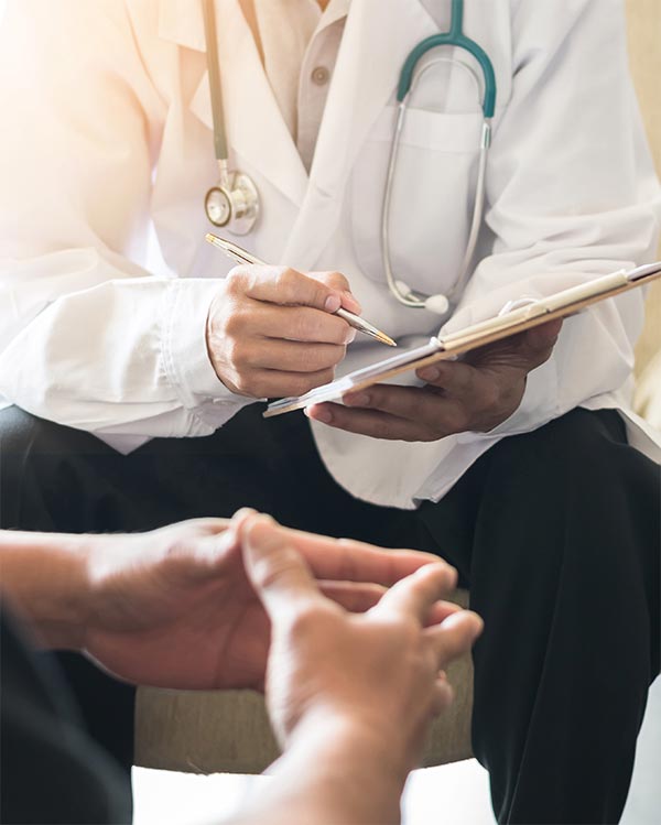 caring doctor with a patient.