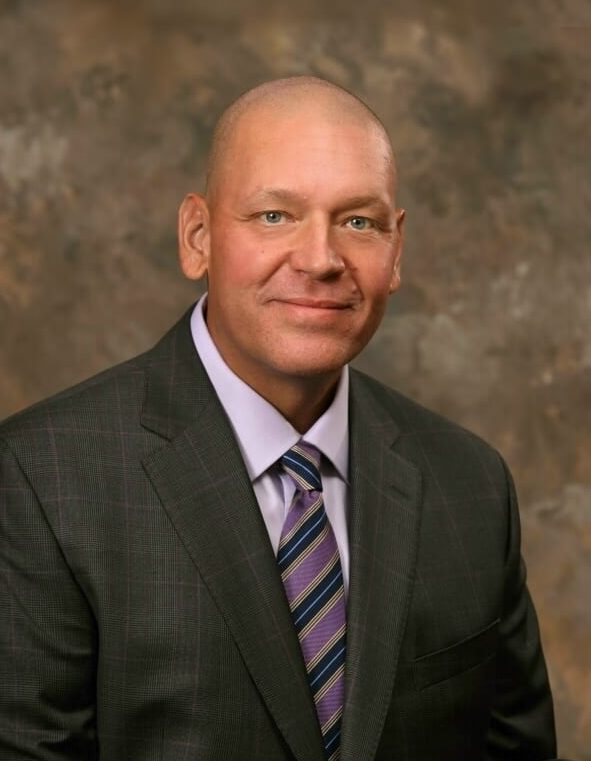 Mark Sulik in a suit.